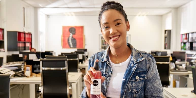 A young woman holding a Nurturer product. The Momentum Metropolitan Foundation is proud to stand behind a company empowering communities and boldly investing in the nation’s future.